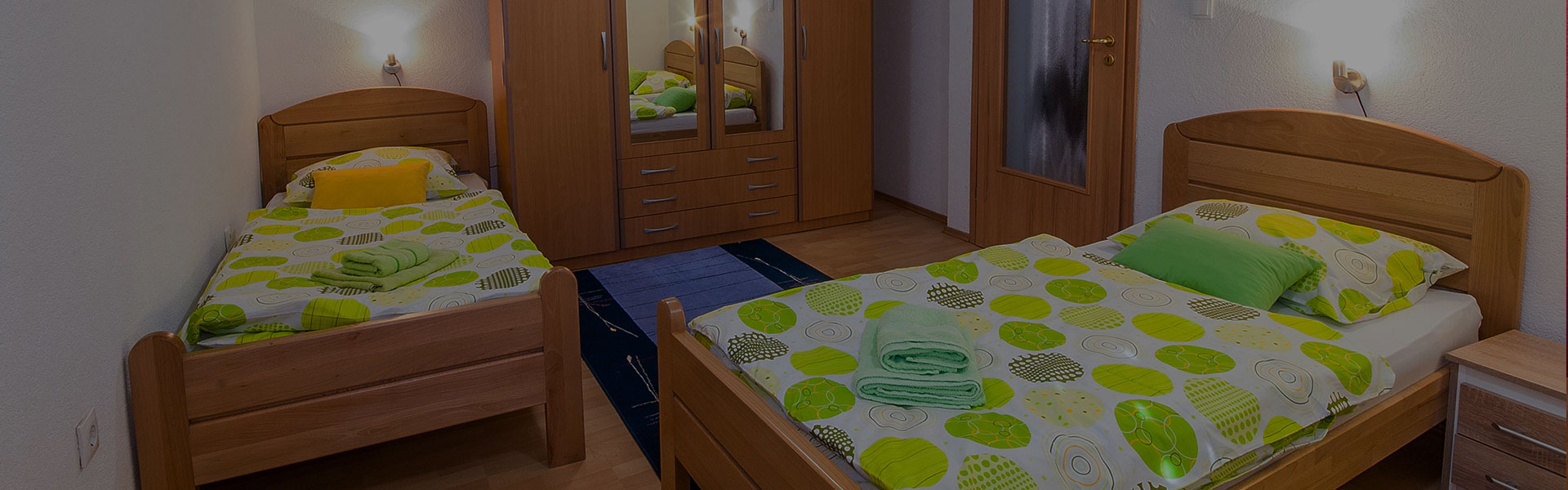 Apartman Hari, pogled na spavaću sobu sa tri odvojena kreveta